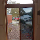 Tinted glass door on a North Carolina home for privacy and heat control