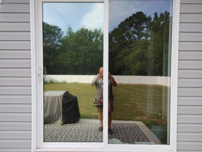 Patio slider with clear heat rejection window film installed by Xtreme Shades