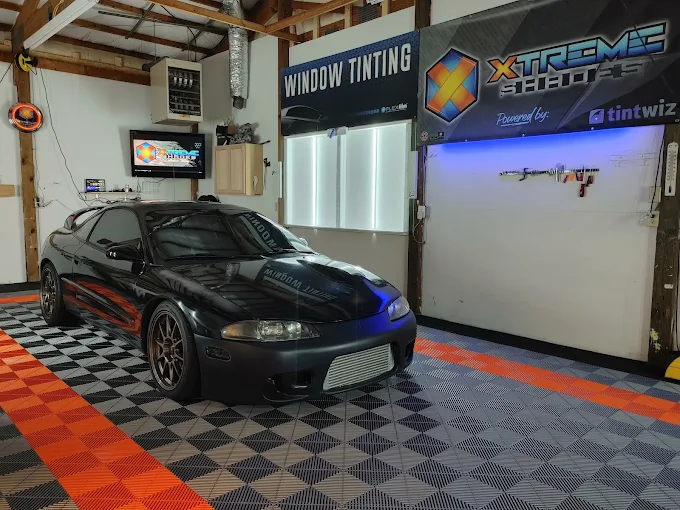 Mitsubishi Eclipse getting ceramic window tint in the Xtreme Shades clean install bay
